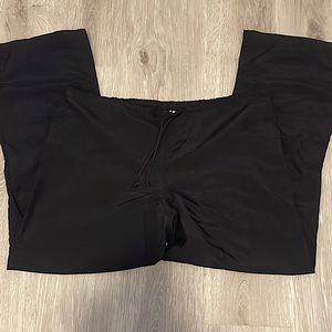 Black parachute pants